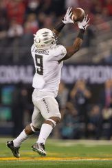 Byron Marshall hauls in a pass against Ohio State in the National Title game.