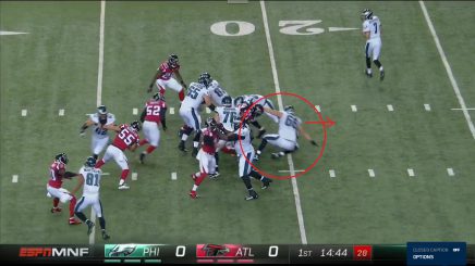 Eagle RG Andrew Gardner goes flying against the Falcons