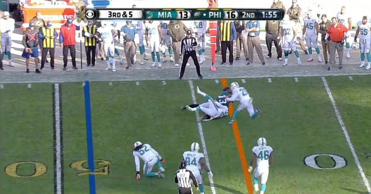 Josh Huff fights through three defenders to get a first down
