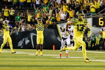Devon Allen runs for touchdown after catch.